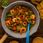 Easy Firecracker Steak And Shrimp Panda Express –You’ll Crave More 3 Top-down view of firecracker steak and shrimp panda express stir fry with vegetables in a skillet